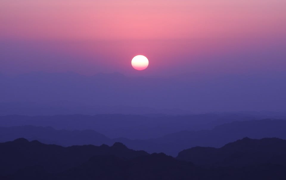 A pink sunrise over the mountains of Sinai. 