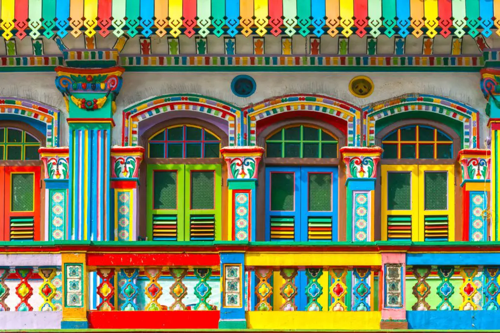 best area to stay in Singapore - a close up of multi color buildings in Little India Singapore