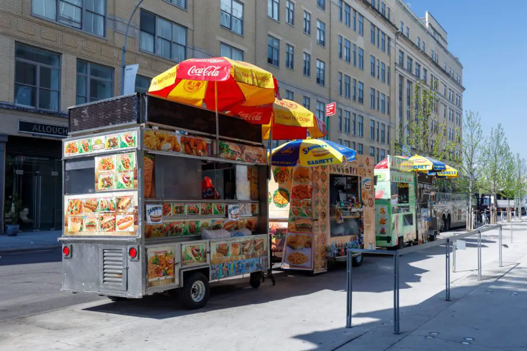 Visiting America for the first time - aline of food trucks in the city