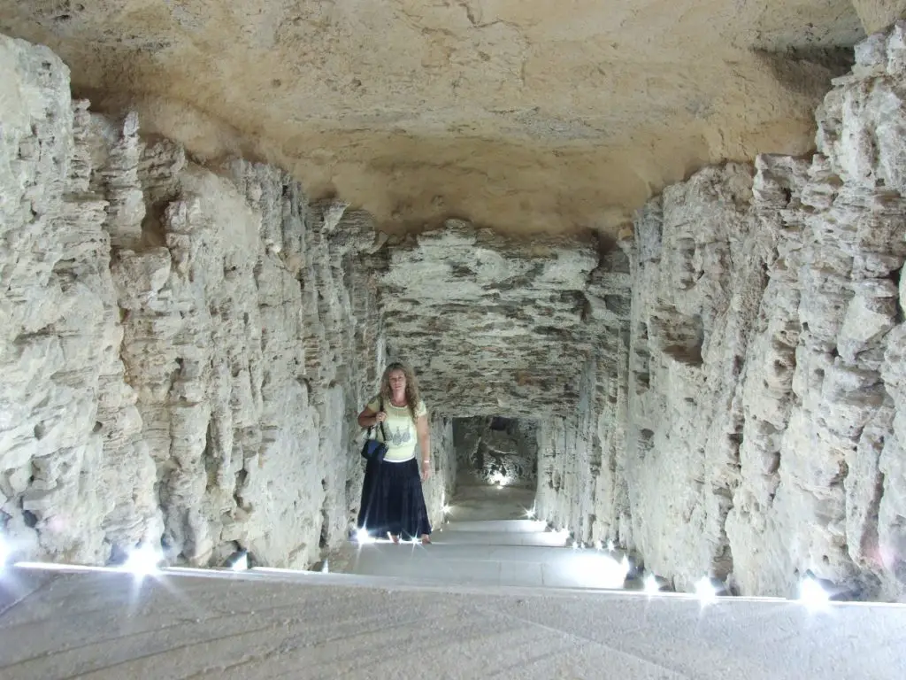 standing inside the catacombs in Alexandria