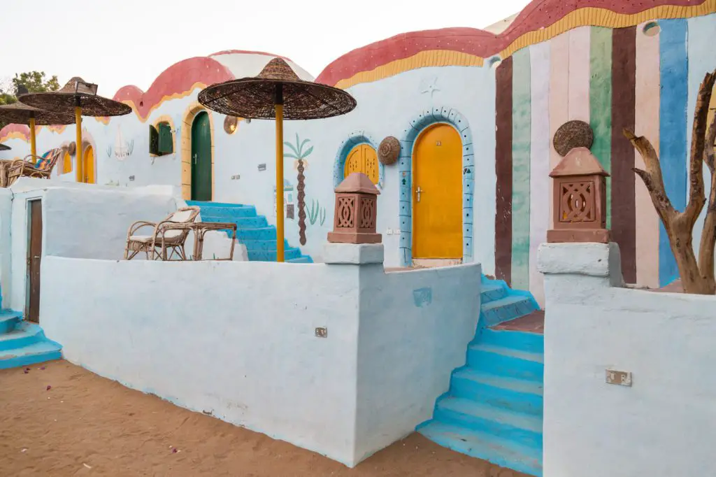 colorful houses in a Nubian village in Aswan Egypt - Egypt on a budget