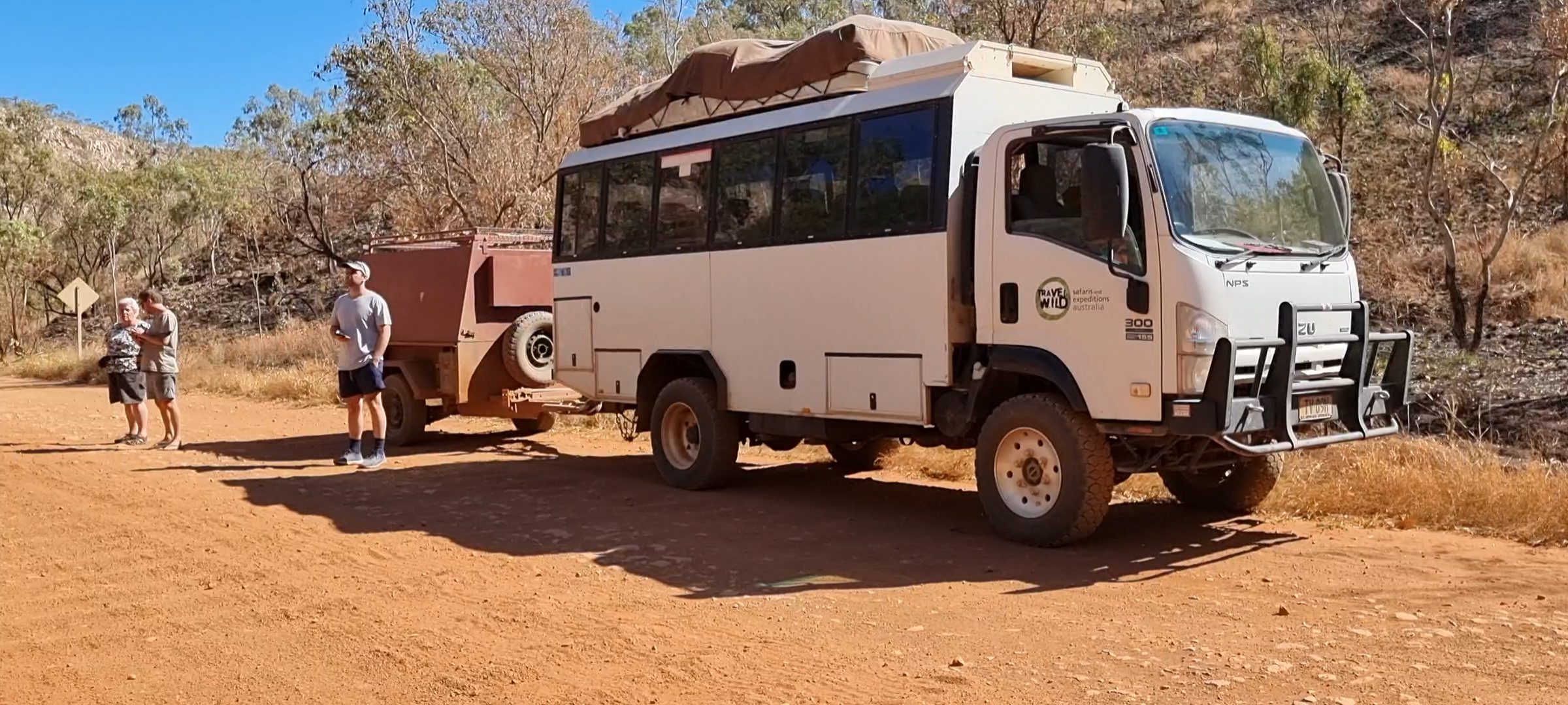 overland truck on the side of red gravel track in the Kimberley's