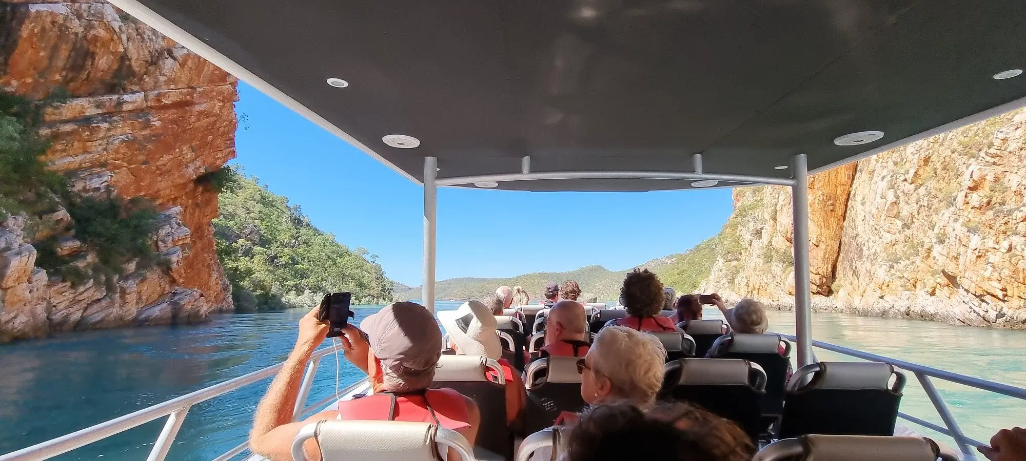 in the boat showing people in front as we cruise through Cyclone creek