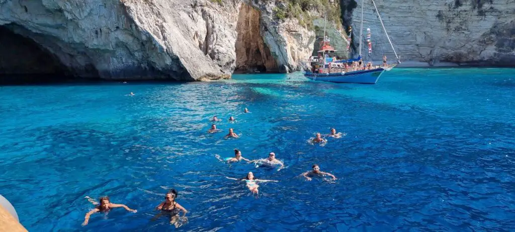swimming in the bluest of water on our tour to Paxos Island
